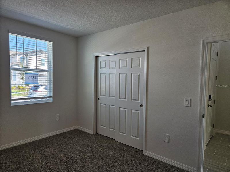 Spacious, unfurnished interior of a new home in Lawson Dunes - Signature Series, Haines City (Image 42).