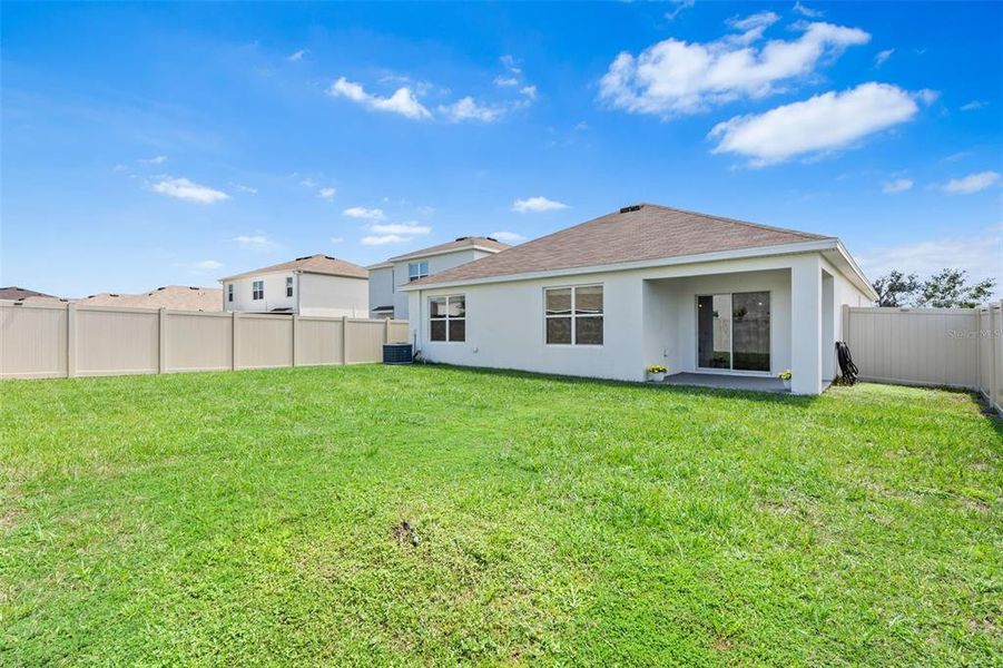 Front exterior of a new home in , Wesley Chapel, FL, highlighting curb appeal (Image 22).