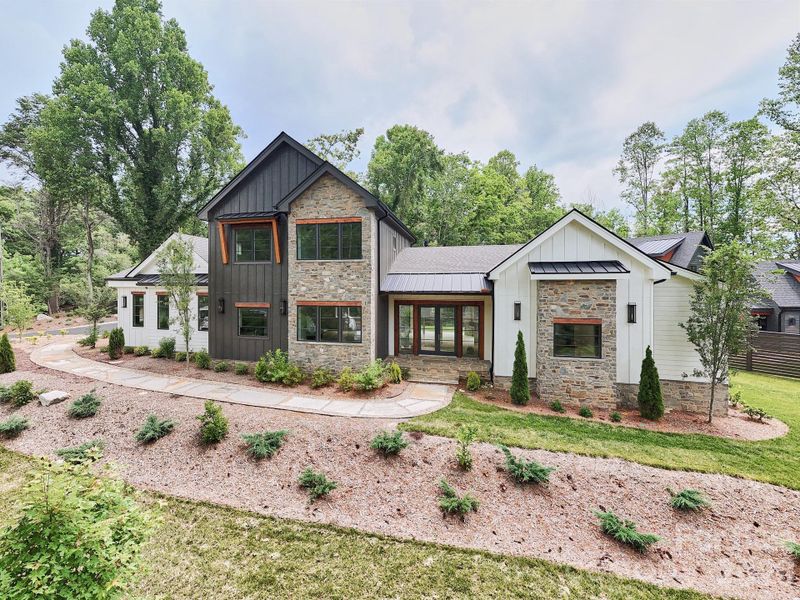 Front exterior of a new home in , Brevard, NC, highlighting curb appeal (Image 27).