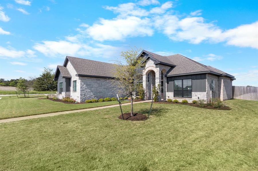 Front exterior of a new home in , Robinson, TX, highlighting curb appeal (Image 2). Front exterior of a new home in , Robinson, TX, highlighting curb appeal (Image 2).