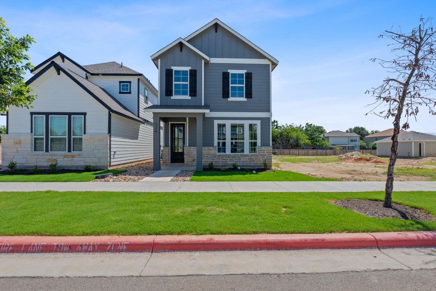 Craftsman house featuring stone siding and board and batten siding Craftsman house featuring stone siding and board and batten siding
