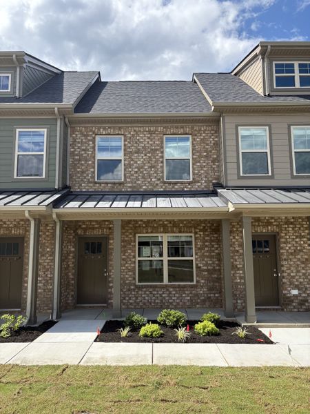 Front exterior of a new home in Talia Trace, Smyrna, TN, highlighting curb appeal (Image 1).