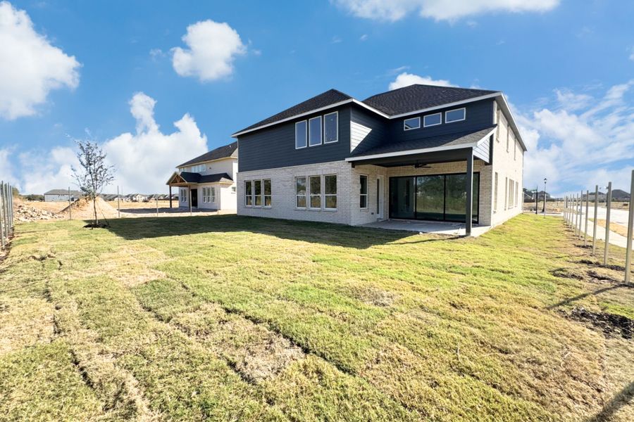 Exterior details and patio area of a home in Wellington, Haslet (Image 8).