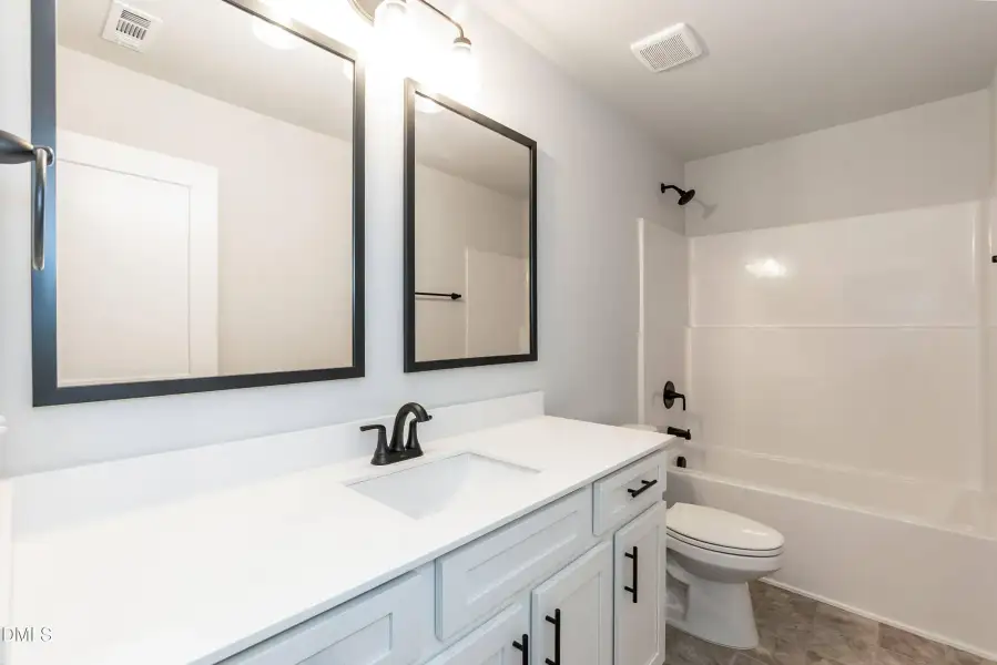 Furnished interior view inside a new home in Hidden Pines, Cameron (Image 8).