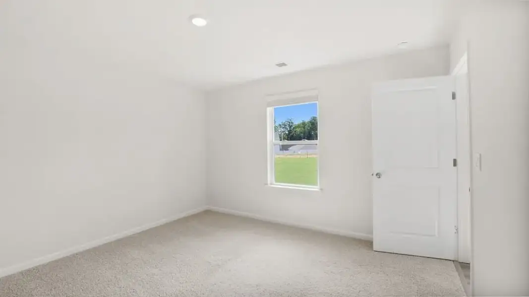 Spacious, unfurnished interior of a new home in Village Grove, Greenville (Image 29).