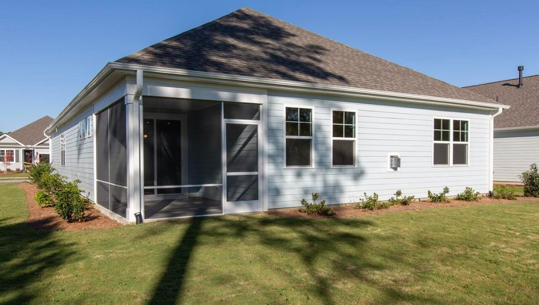 Exterior details and patio area of a home in Indigo Preserve, Leland (Image 2).