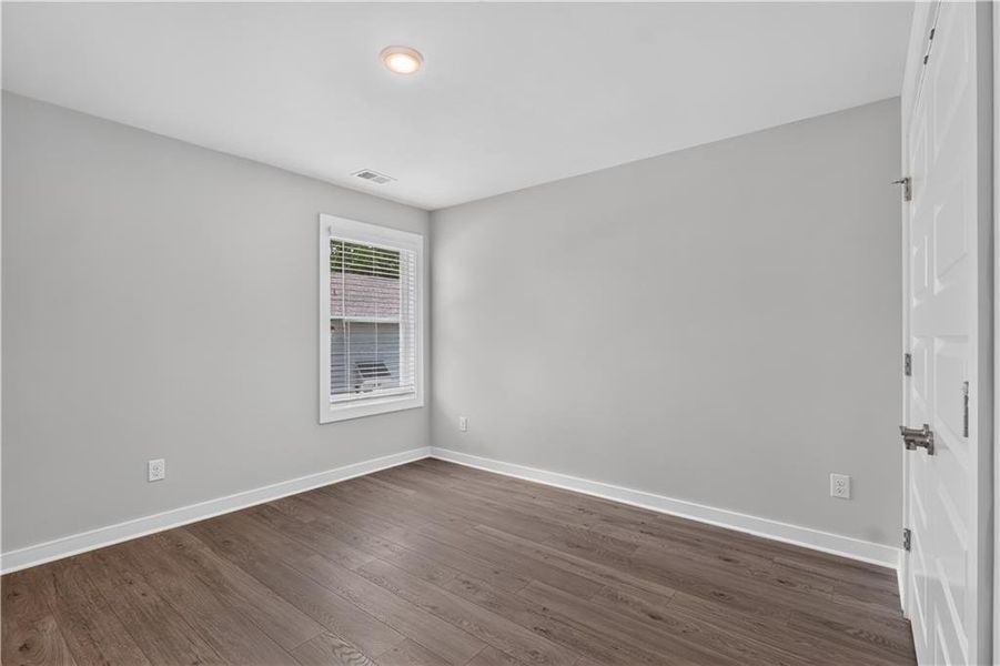 Spacious, unfurnished interior of a new home in The Cottages at East Lanier, Fayetteville (Image 17).