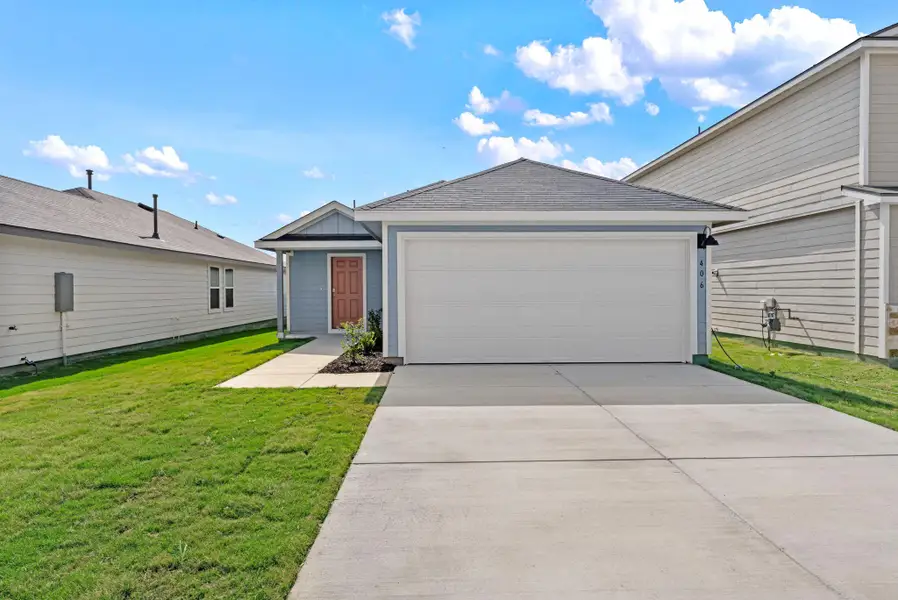Front exterior of a new home in , San Marcos, TX, highlighting curb appeal (Image 1). Front exterior of a new home in , San Marcos, TX, highlighting curb appeal (Image 1).