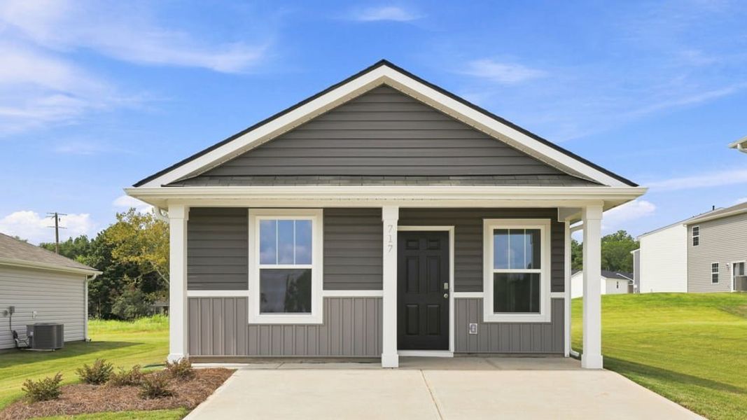 Front exterior of a new home in Village 3, Woodruff, SC, highlighting curb appeal (Image 1). Front exterior of a new home in Village 3, Woodruff, SC, highlighting curb appeal (Image 1).