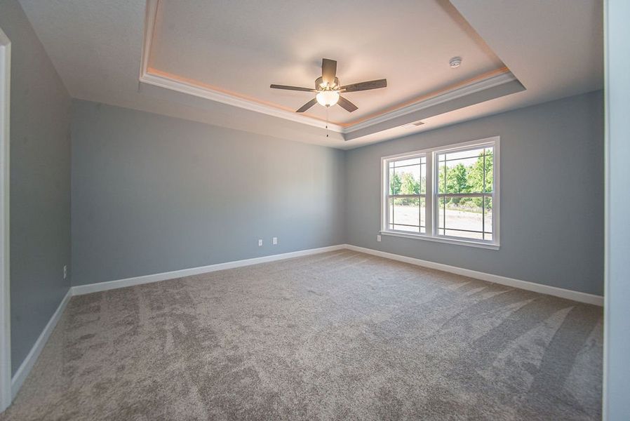 Representative unfurnished interior of a home built from the Jackson by Enchanted Homes in Lonesome Dove, San Antonio (Image 49).