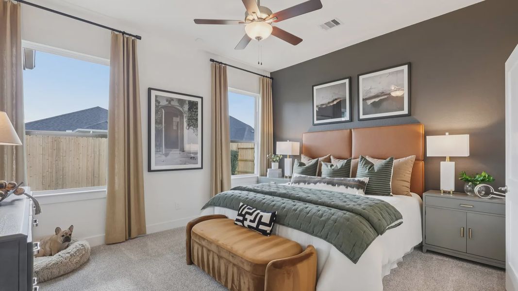 Representative furnished interior of a home built from the Adele by Chesmar Homes in Sunterra, Katy (Image 14).