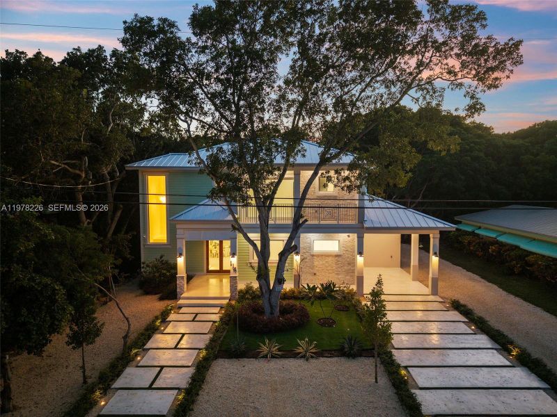 Front exterior of a new home in , Islamorada, Village of Islands, FL, highlighting curb appeal (Image 28).