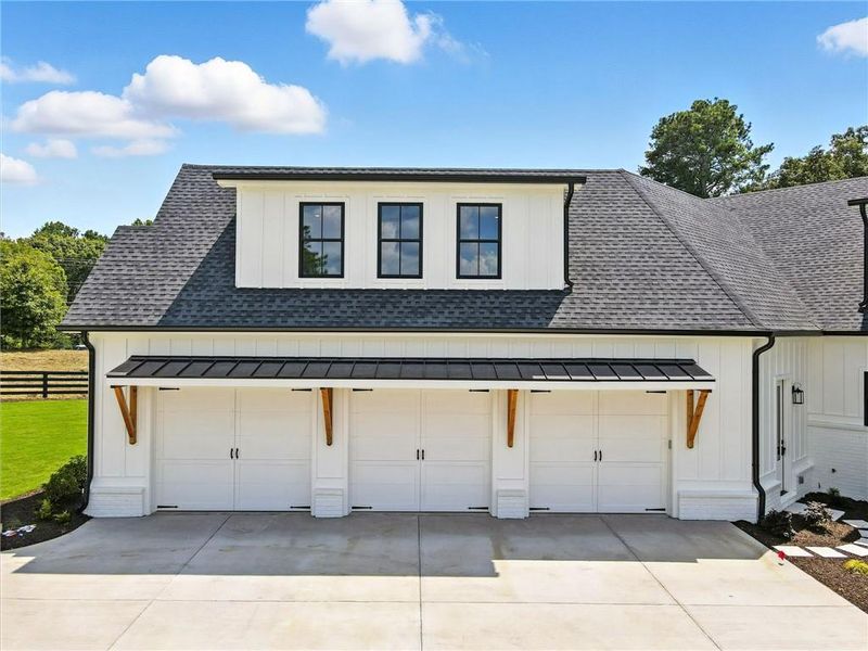 Front exterior of a new home in , Canton, GA, highlighting curb appeal (Image 27).