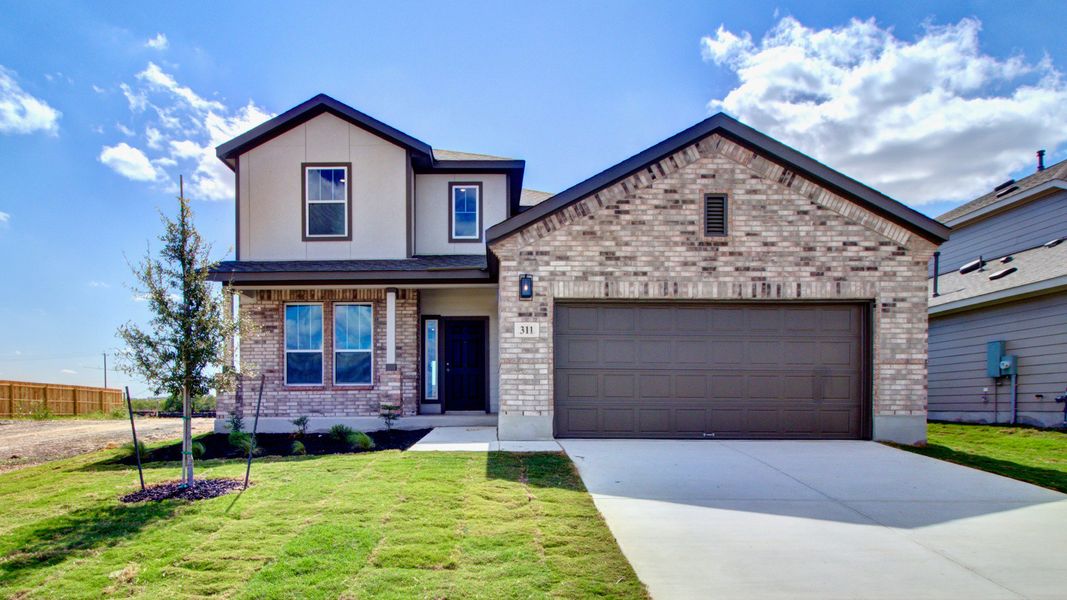 Front exterior of a home in the Westridge - Premier community, located in San Antonio, TX (Image 10).
