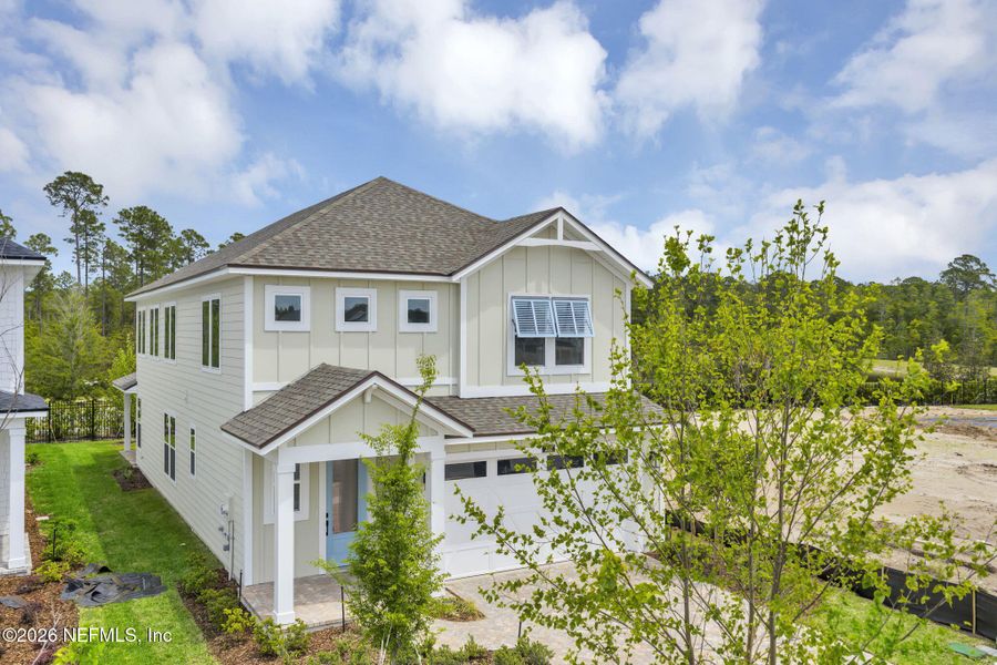 Front exterior of a new home in Seabrook Village at Seabrook, Ponte Vedra, FL, highlighting curb appeal (Image 24). Front exterior of a new home in Seabrook Village at Seabrook, Ponte Vedra, FL, highlighting curb appeal (Image 24).