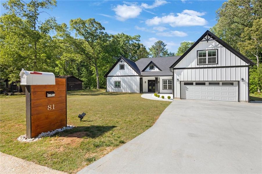 Front exterior of a new home in , Riverdale, GA, highlighting curb appeal (Image 1). Front exterior of a new home in , Riverdale, GA, highlighting curb appeal (Image 1).