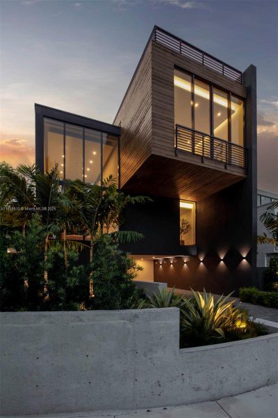 Front exterior of a new home in , Miami, FL, highlighting curb appeal (Image 1). Front exterior of a new home in , Miami, FL, highlighting curb appeal (Image 1).