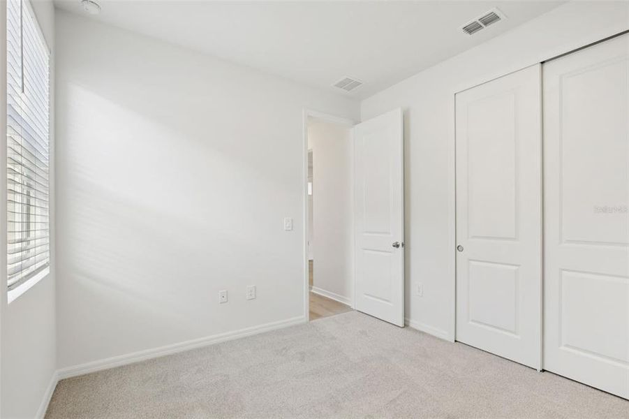 Spacious, unfurnished interior of a new home in Coasterra - Reserve Series, Palmetto (Image 26).