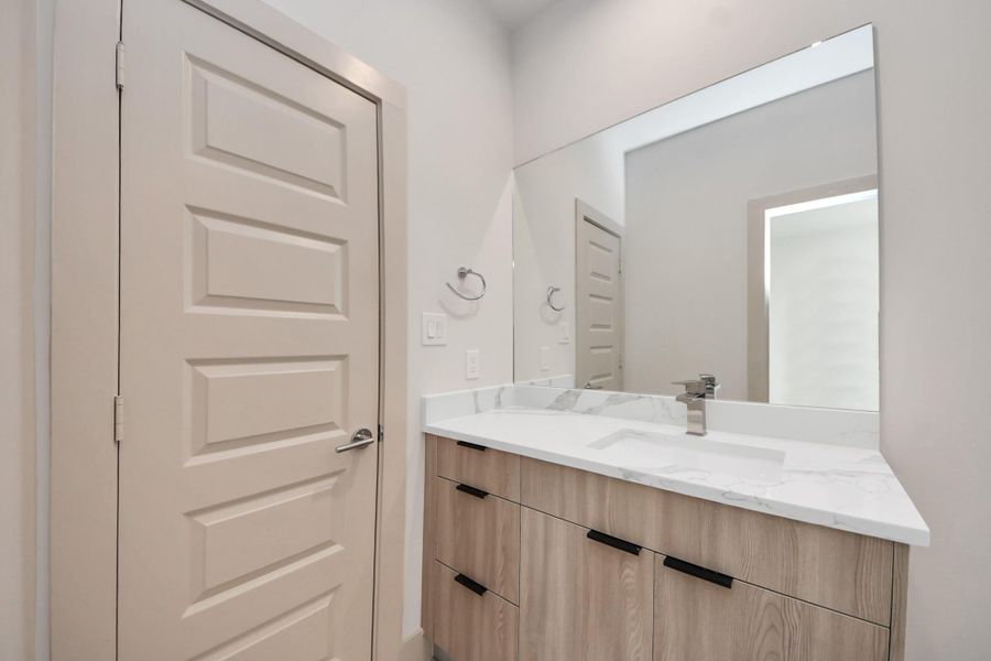 Furnished interior view inside a new home in Agua, Houston (Image 6). Furnished interior view inside a new home in Agua, Houston (Image 6).