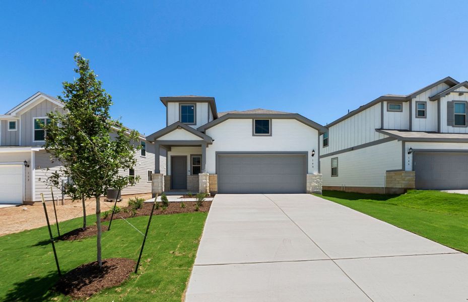 Front exterior of a new home in Sonterra, Jarrell, TX, highlighting curb appeal (Image 22). Front exterior of a new home in Sonterra, Jarrell, TX, highlighting curb appeal (Image 22).