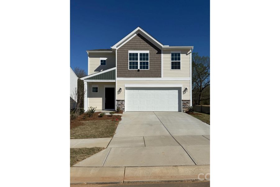 Front exterior of a new home in Cleveland Hill, Shelby, NC, highlighting curb appeal (Image 1). Front exterior of a new home in Cleveland Hill, Shelby, NC, highlighting curb appeal (Image 1).
