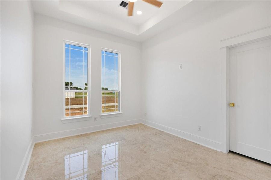 Another angle of the bedroom with large windows and abundant natural light. Another angle of the bedroom with large windows and abundant natural light.