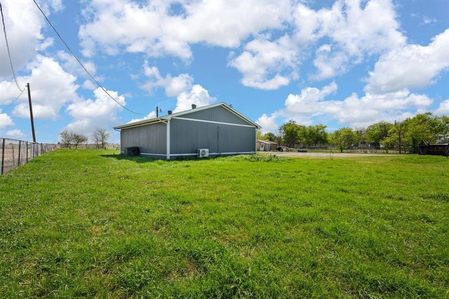 Exterior details and patio area of a home in , Joshua (Image 21).
