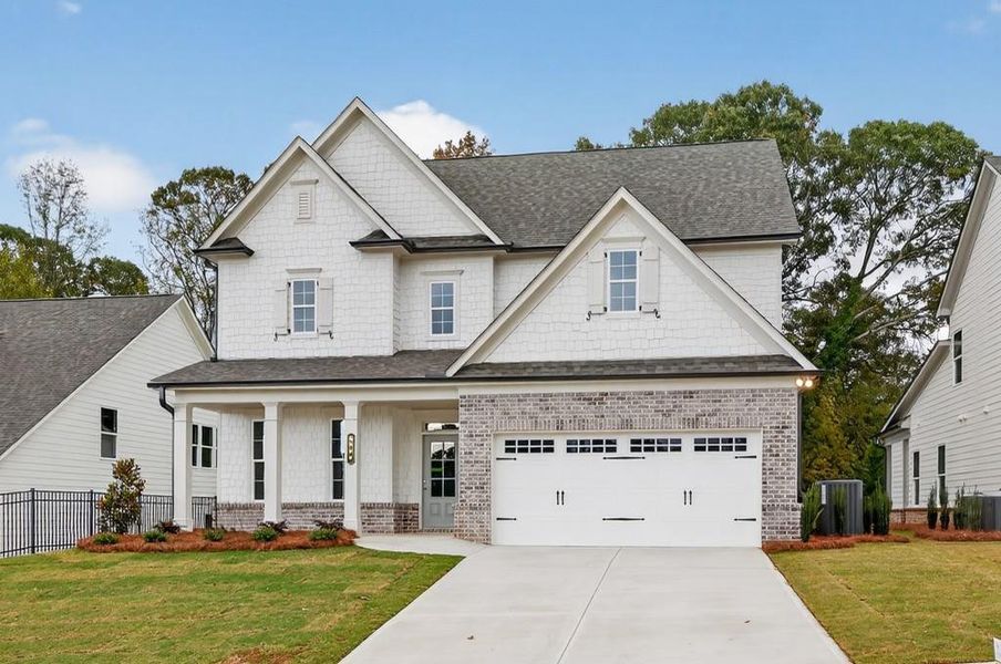 Front exterior of a new home in Hemingway, Flowery Branch, GA, highlighting curb appeal (Image 2).