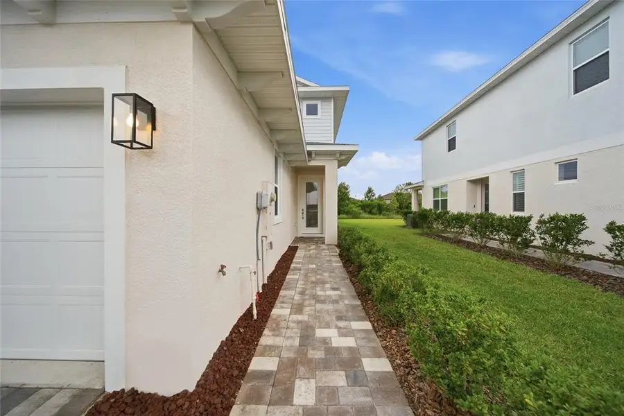 Exterior details and patio area of a home in , Wesley Chapel (Image 31).