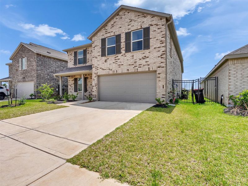 Front exterior of a new home in , Katy, TX, highlighting curb appeal (Image 24).