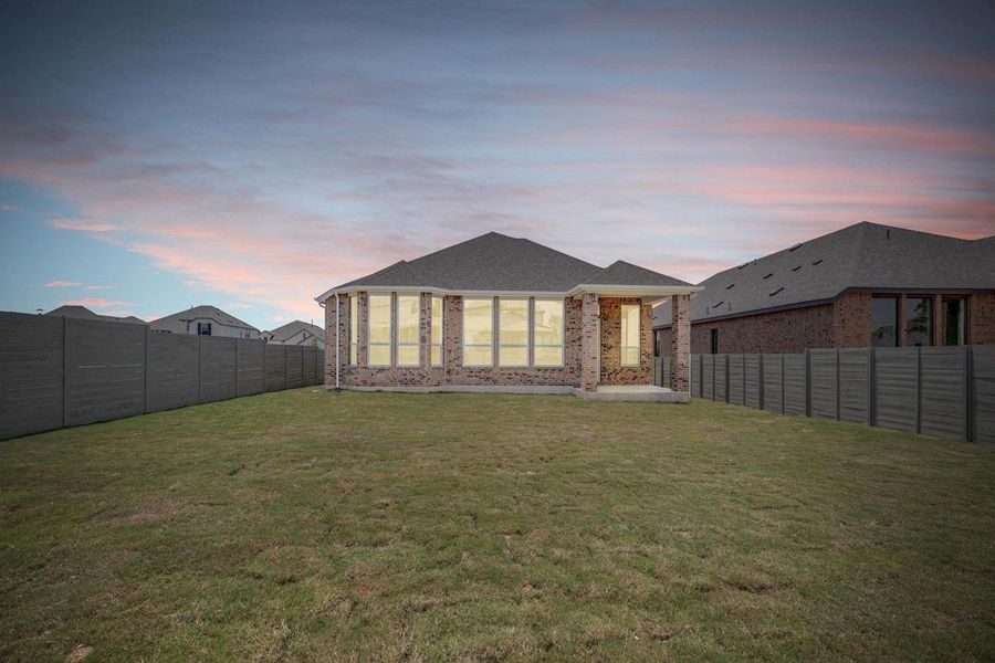 Front exterior of a new home in Wolf Ranch: 51ft. lots, Georgetown, TX, highlighting curb appeal (Image 20). Front exterior of a new home in Wolf Ranch: 51ft. lots, Georgetown, TX, highlighting curb appeal (Image 20).