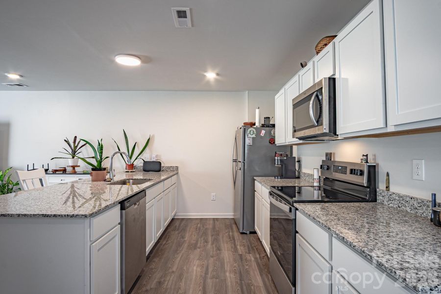 Furnished interior view inside a new home in Trivium, Newton (Image 23).