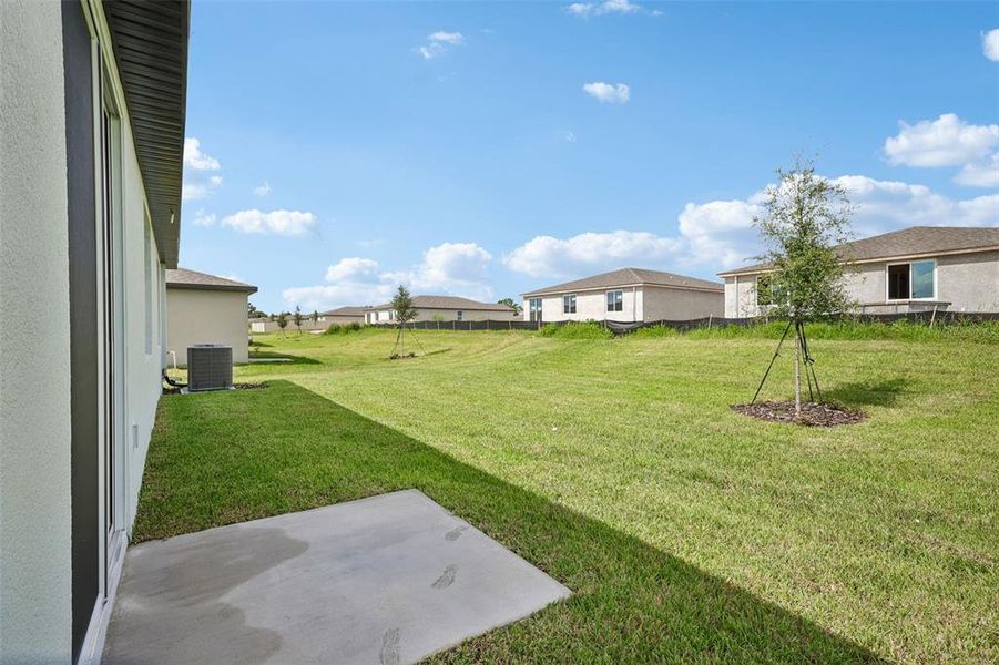 Exterior details and patio area of a home in The Reserve at Van Oaks, Auburndale (Image 21).