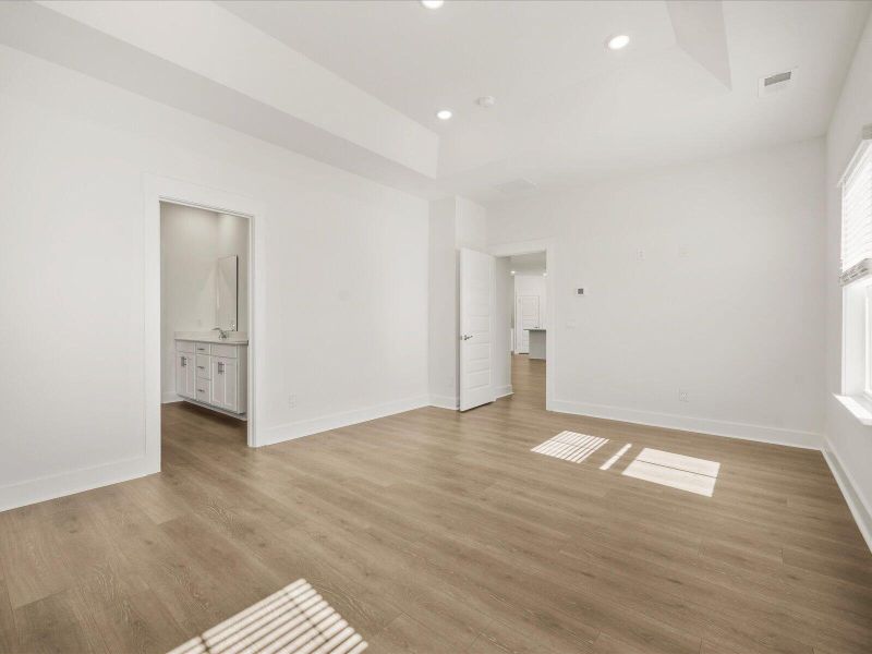Spacious, unfurnished interior of a new home in The Coves at Lakes of Cane Bay II, Summerville (Image 22). Spacious, unfurnished interior of a new home in The Coves at Lakes of Cane Bay II, Summerville (Image 22).