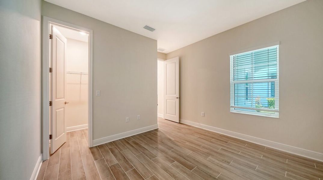 Spacious, unfurnished interior of a new home in Windward Real Estate and Homes for Sale in Sarasota, FL - Neal Communities, Lakewood Ranch (Image 31).