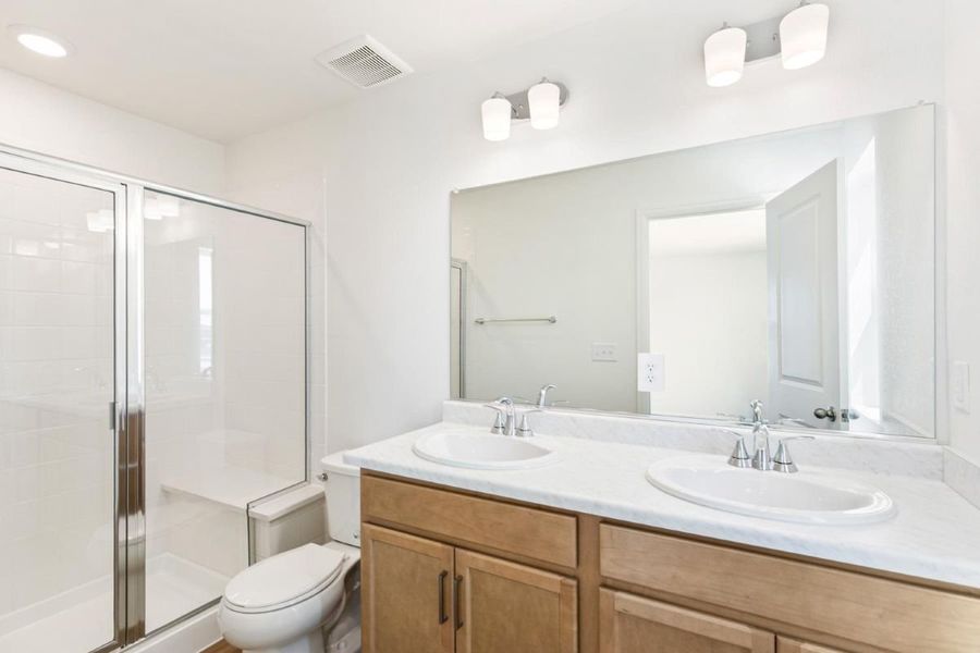 Furnished interior view inside a new home in Sky Ranch Villas, Watkins (Image 10).