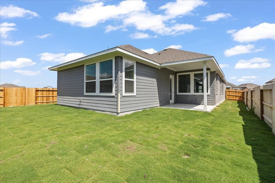 Exterior details and patio area of a home in Village at Three Oaks, Seguin (Image 4). Exterior details and patio area of a home in Village at Three Oaks, Seguin (Image 4).