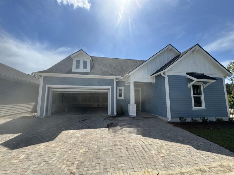 Front exterior of a new home in Nexton – Midtown – The Garden Collection, Summerville, SC, highlighting curb appeal (Image 21). Front exterior of a new home in Nexton – Midtown – The Garden Collection, Summerville, SC, highlighting curb appeal (Image 21).