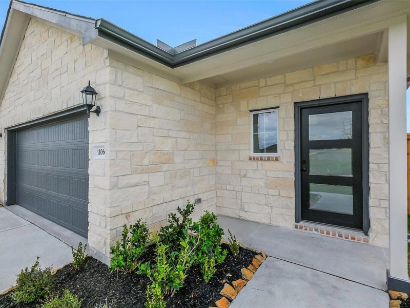 Exterior details and patio area of a home in Emberly, Beasley (Image 3).
