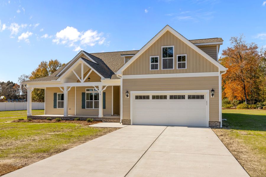 Front exterior of a new home in Kennedy's Crossing, Grimesland, NC, highlighting curb appeal (Image 20).