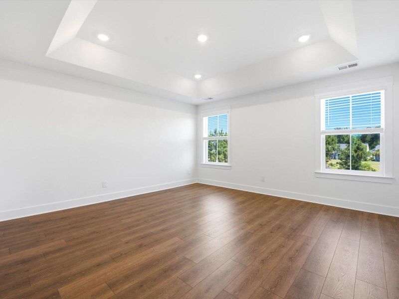 Spacious, unfurnished interior of a new home in The Coves at Lakes of Cane Bay II, Summerville (Image 23). Spacious, unfurnished interior of a new home in The Coves at Lakes of Cane Bay II, Summerville (Image 23).