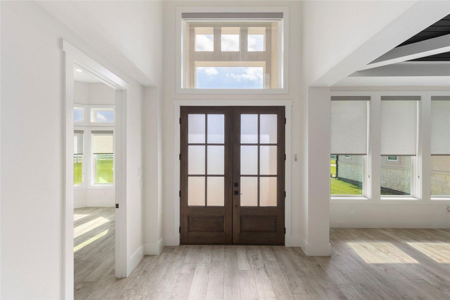 Looking back at the front door you will find the office on the left and the dining room on the right. Looking back at the front door you will find the office on the left and the dining room on the right.