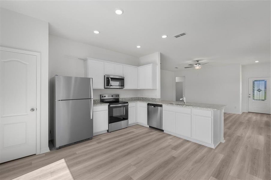 Furnished interior view inside a new home in Gum Lake Preserve, Lake Alfred (Image 6).