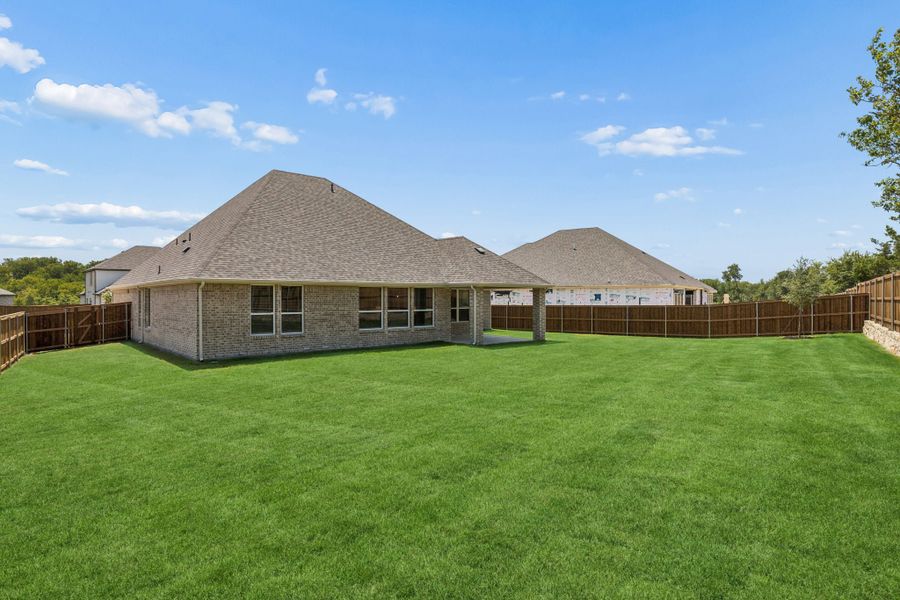 Exterior details and patio area of a home in Rainwater Crossing, Celina (Image 3). Exterior details and patio area of a home in Rainwater Crossing, Celina (Image 3).