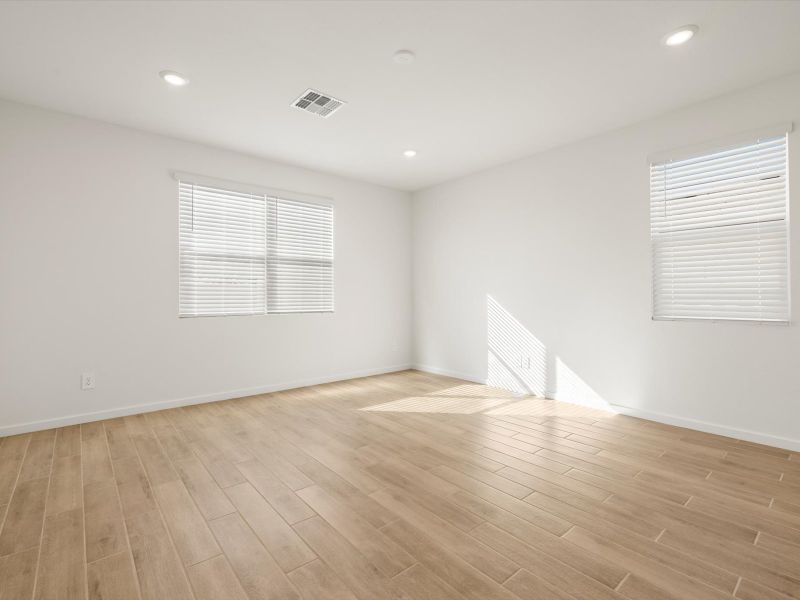 Spacious, unfurnished interior of a new home in White Tank Foothills Signature Series, Waddell (Image 8).