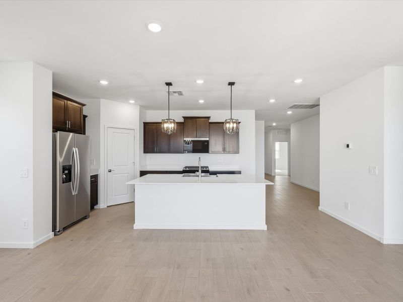 Furnished interior view inside a new home in Mountain View Estates Reserve Series, Buckeye (Image 5).