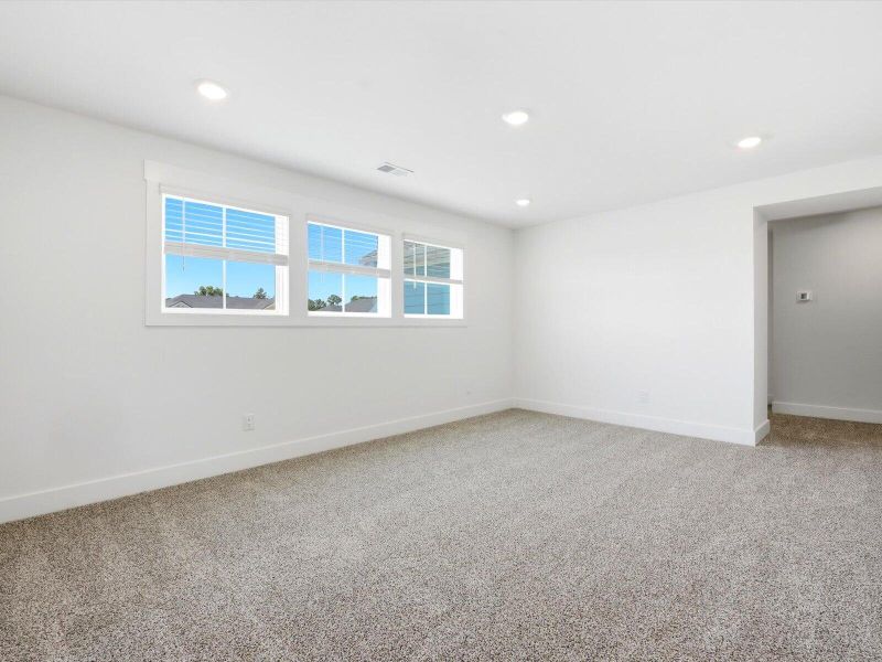 Spacious, unfurnished interior of a new home in The Coves at Lakes of Cane Bay II, Summerville (Image 21). Spacious, unfurnished interior of a new home in The Coves at Lakes of Cane Bay II, Summerville (Image 21).