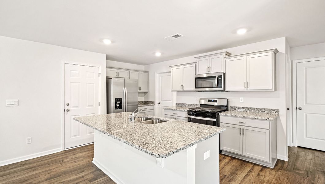 Furnished interior view inside a new home in Paddock Point, Roebuck (Image 6).