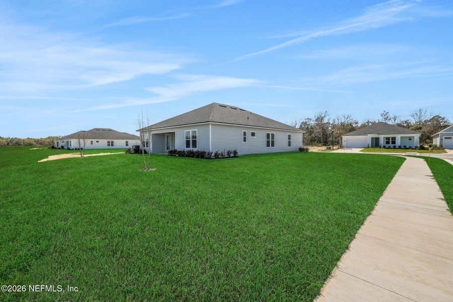 Exterior details and patio area of a home in Veranda Bay, Flagler Beach (Image 29).