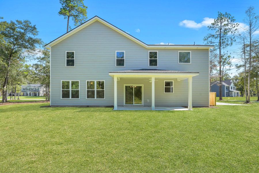 Representative exterior photo of a completed home built from the The Stonecrest by Smith Family Homes in Ramsey Landing, Rincon, GA (Image 27).